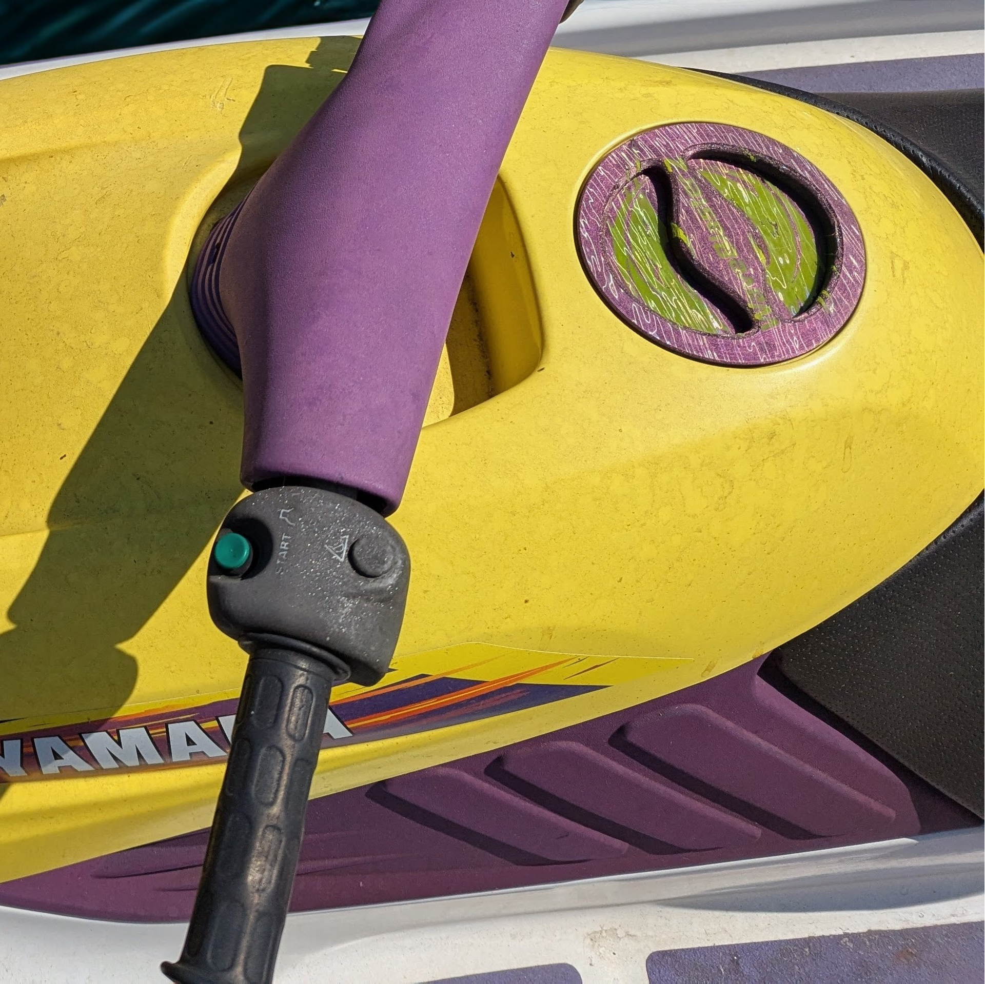 Close-up of a yellow and purple Yamaha WaveBlaster 2 with new hood and storage lid. Made by Quenchifying